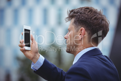 Businessman using mobile phone
