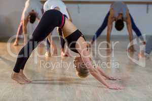 Woman performing stretching exercise