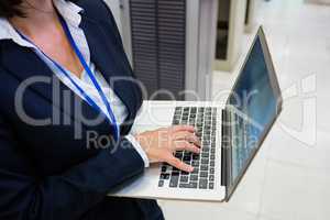 Technician working on laptop