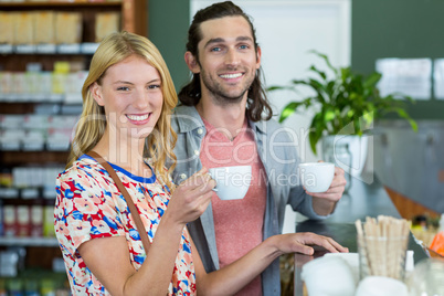 Couple having coffee in supermarket cafÃ?Â©