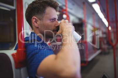 Handsome man drinking coffee