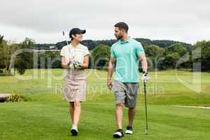 Couple interacting with each other while walking