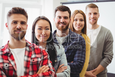 Creative business people standing in row