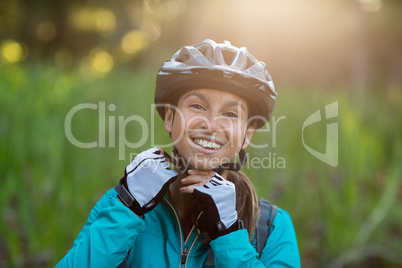 Female biker wearing bicycle helmet