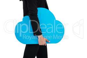 Businesswoman holding cloud symbol against white background