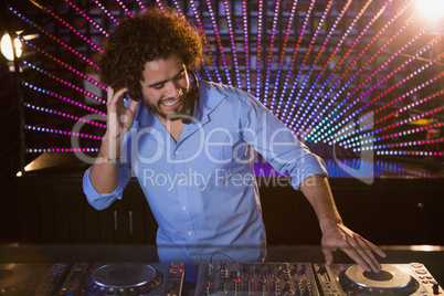 Male DJ playing music