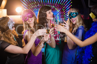 Group of friends toasting glass of champagne