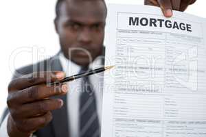 Businessman showing mortgage document
