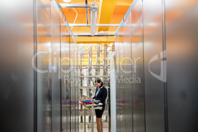 Technician working in server room