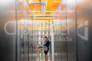 Technician working in server room