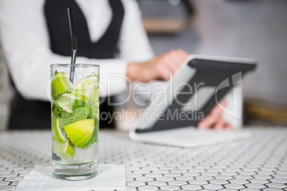 Glass of mojito on a bar counter
