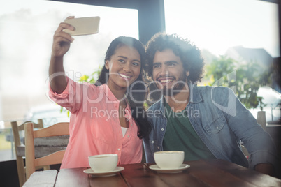 Couple taking selfie from mobile phone