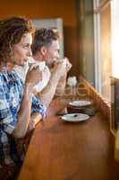 Couple having coffee in cafÃ?Â©