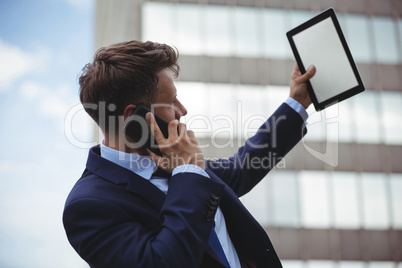 Businessman talking on mobile phone