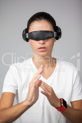 Woman using virtual video glasses