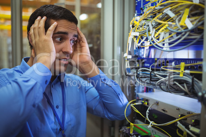 Technician getting stressed over server maintenance