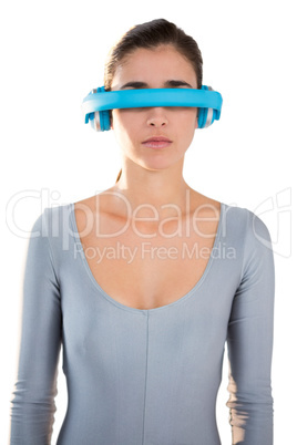 Woman in exercise outfit using virtual video glasses