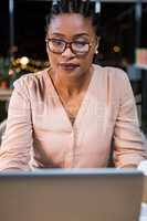 Businesswoman working on laptop