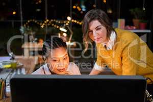 Women looking at computer
