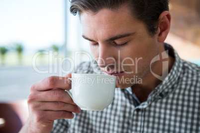 Man having coffee in coffee shop