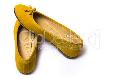 yellow female shoes on a white background