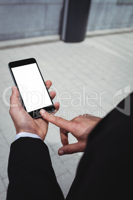 Businessman using mobile phone