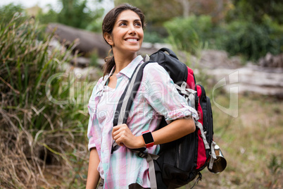 Female hiker hiking in forest