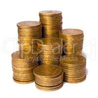 piles of gold coins isolated on white background, close up view