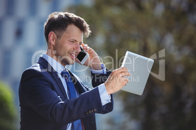 Businessman talking on mobile phone