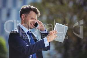 Businessman talking on mobile phone