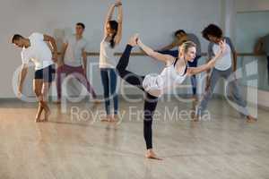 Woman performing stretching exercise