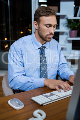 Business executive working on computer in office