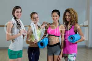 Women posing in fitness studio