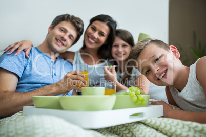 Portrait of family having breakfast