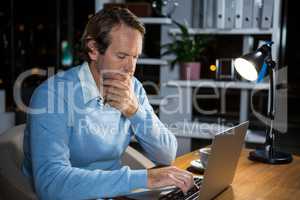 Businessman working on laptop