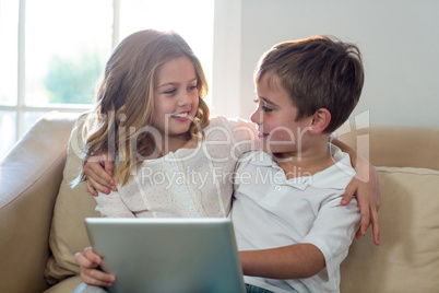 Children using digital tablet