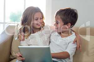 Children using digital tablet