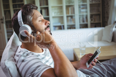 Man listening to music on headphones