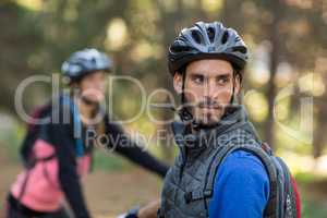 Male biker in forest