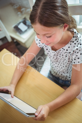 Girl using digital tablet