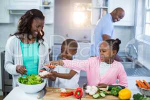 Happy family preparing food