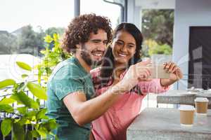 Couple taking selfie from mobile phone