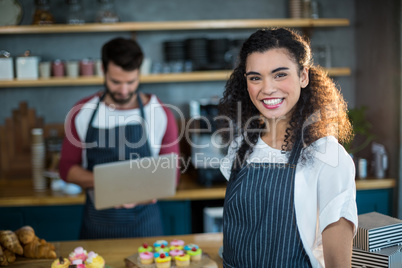 Smiling waitress in caf�© Smiling waitress in caf�©