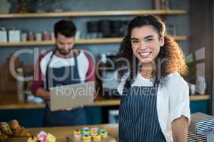 Smiling waitress in cafÃ?Â©