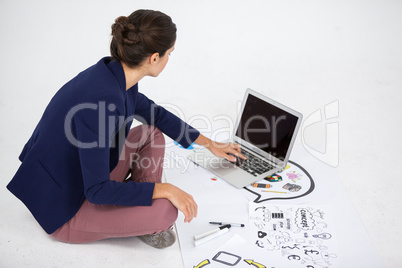 Businesswoman using a laptop