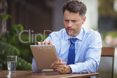 Businessman using digital tablet