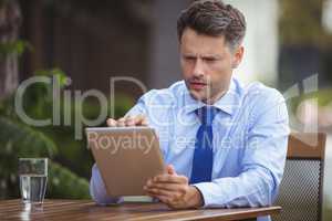 Businessman using digital tablet