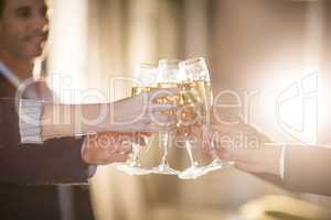 Group of businesspeople toasting glasses of champagne