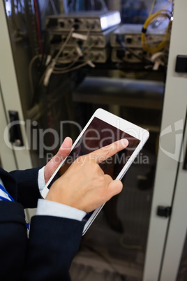 Technician using digital tablet