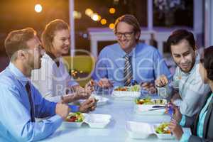 Group of businesspeople having meal
